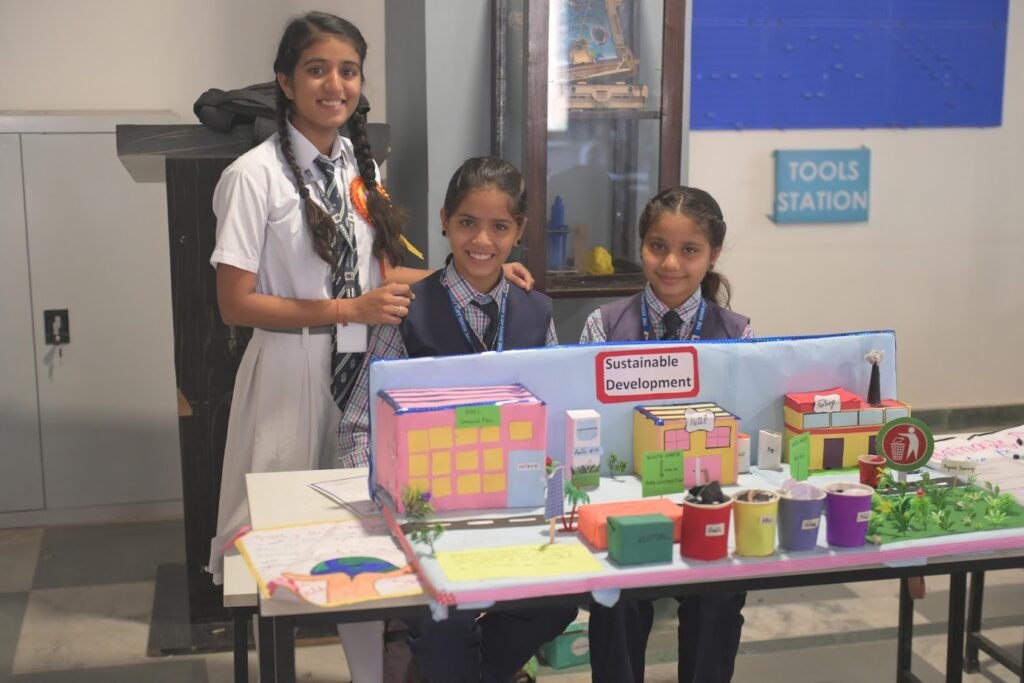 Students in a Nagaland school STEM lab present their sustainable development project model.