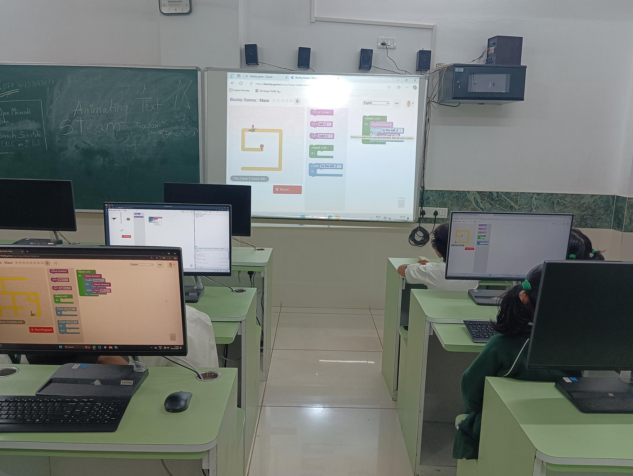 Students participate in a Blockly programming session as part of STEM education in Dehradun.