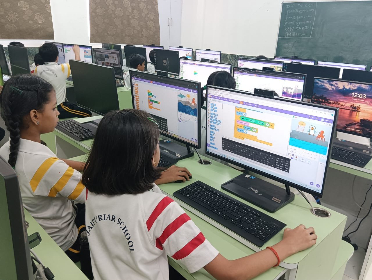 Kids work on computer