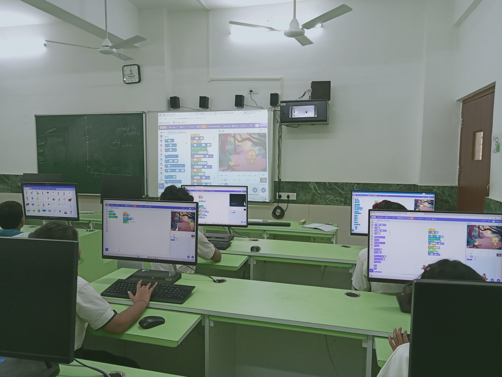 Children at computer desk