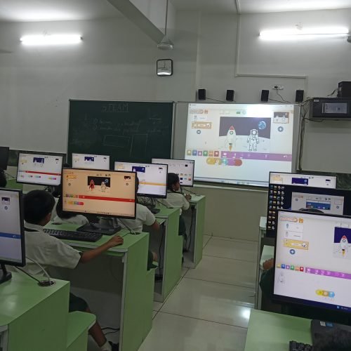 Children exploring computer