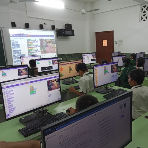 Children at computer desk