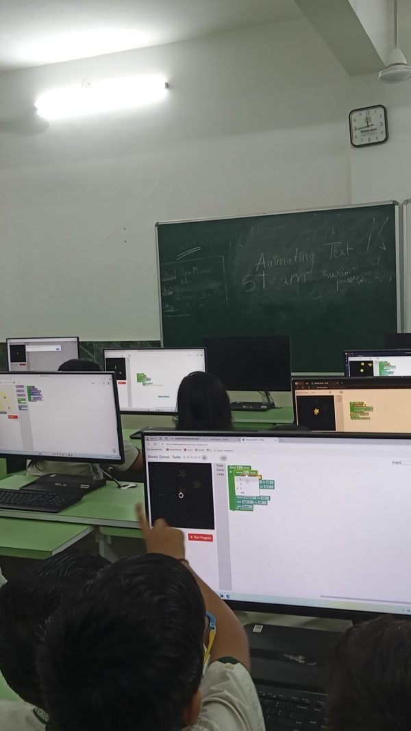 Students engaging in coding activities in a STEM lab in Chhattisgarh schools.