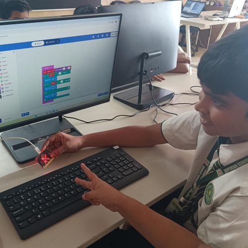 Children building electronics